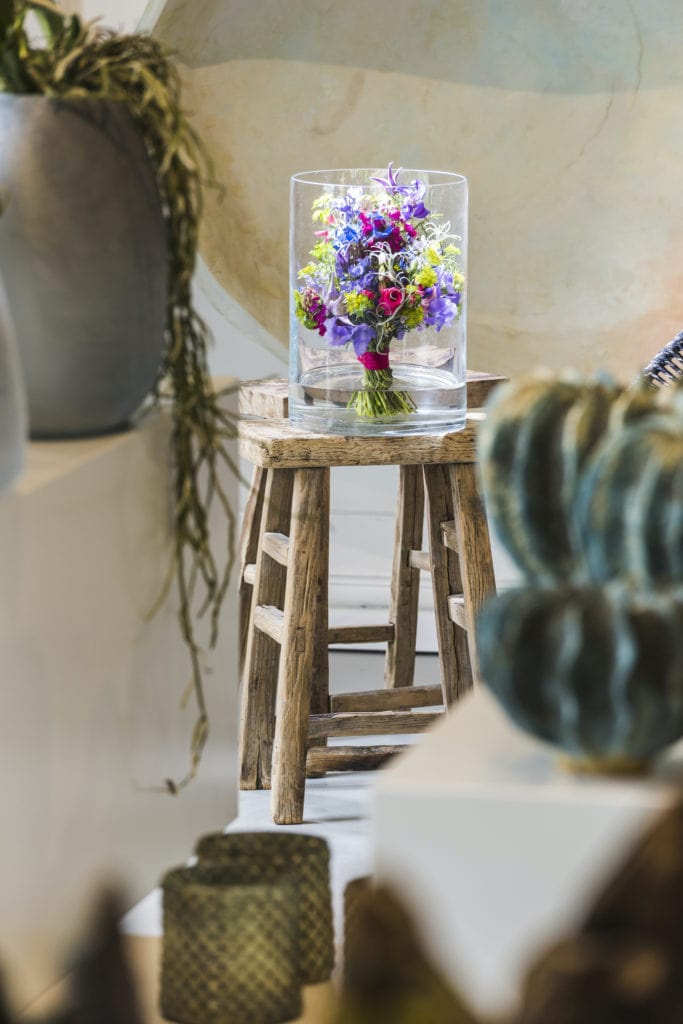 Wooden stool with beautiful flower arrangement