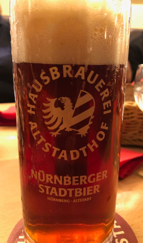 A glass of red beer from the Altstadthof brewery in Nuremberg