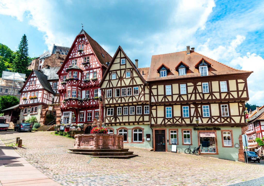 Colorful half-timbered houses on the market place (Alter Marktplatz) in old german town Miltenberg am Main river