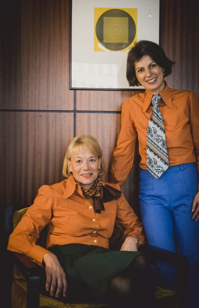 Two receptionists in retro-look