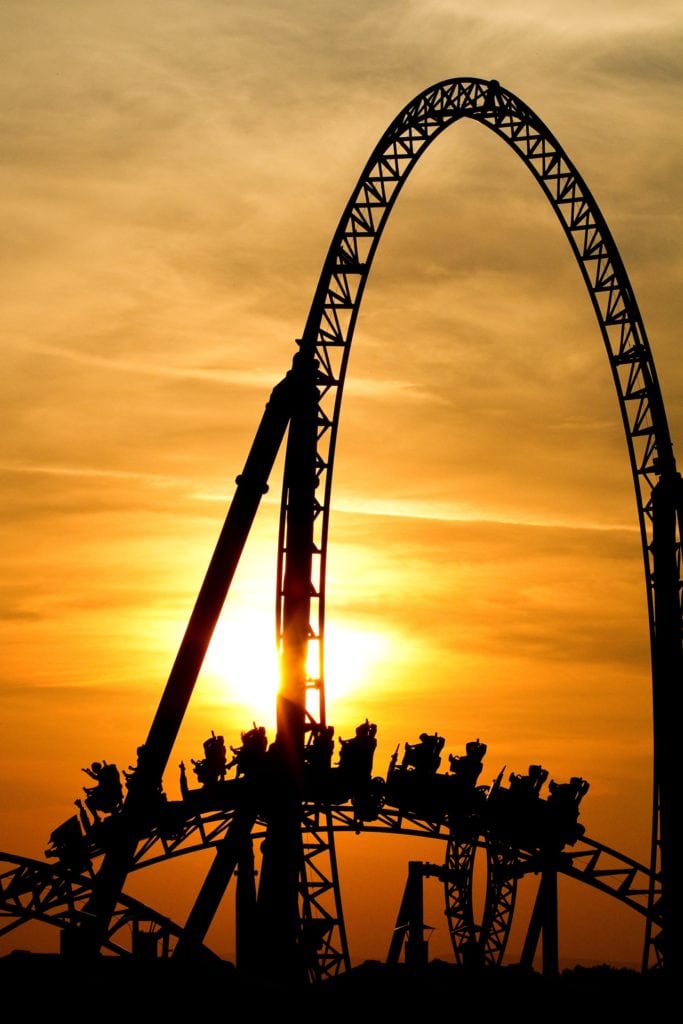 Rollercoaster during sunset in amusement park Europa Park Rust in Germany