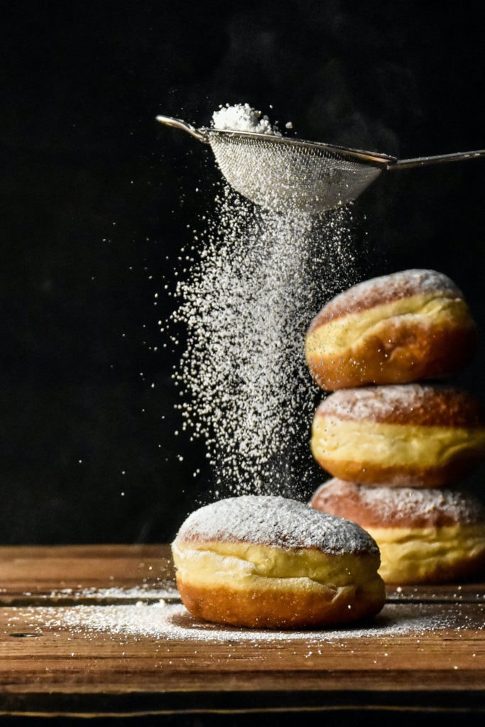 Pancakes are dusted with icing sugar