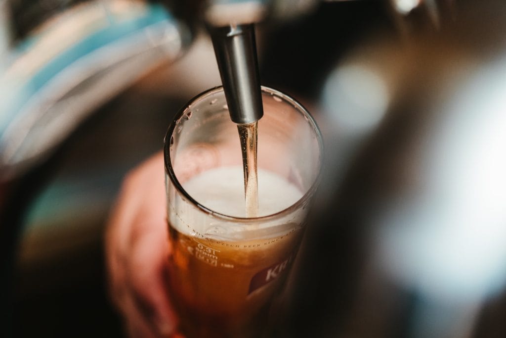 Someone taps a beer in a German brewery