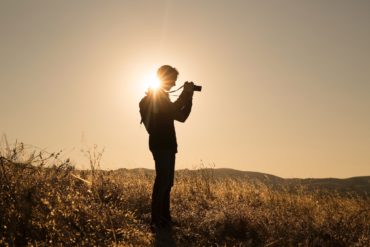 Young photographer in German landscape