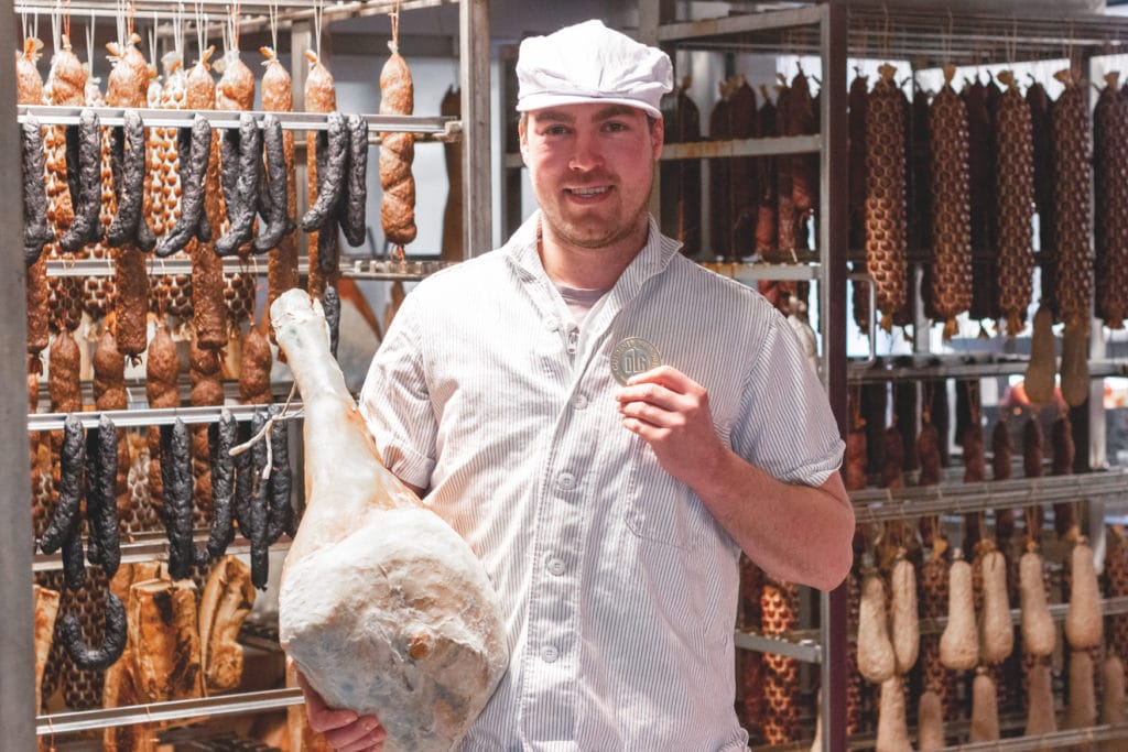 Man in meat chamber in one of the organic farms in Lower Bavaria