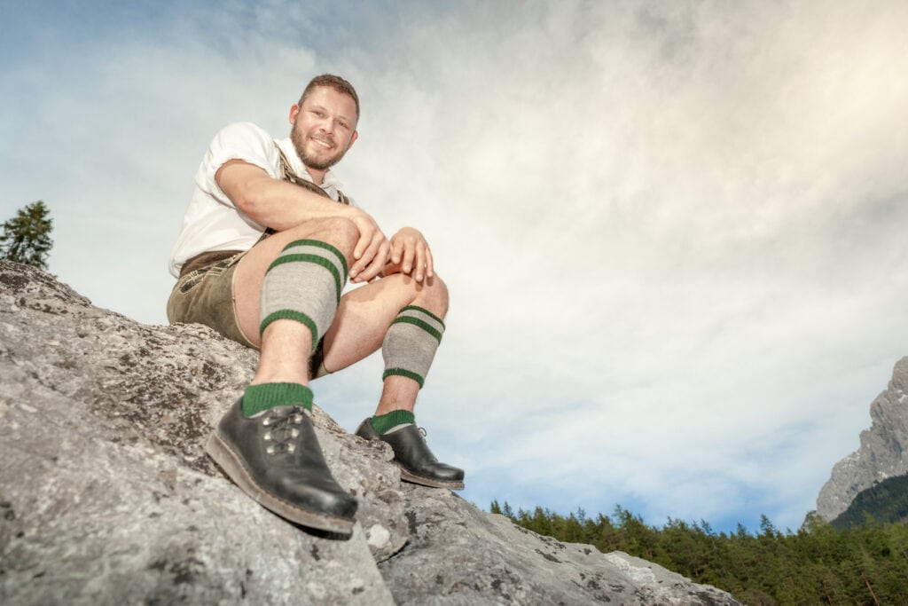 Young man wearing traditional shoes from Bavaria