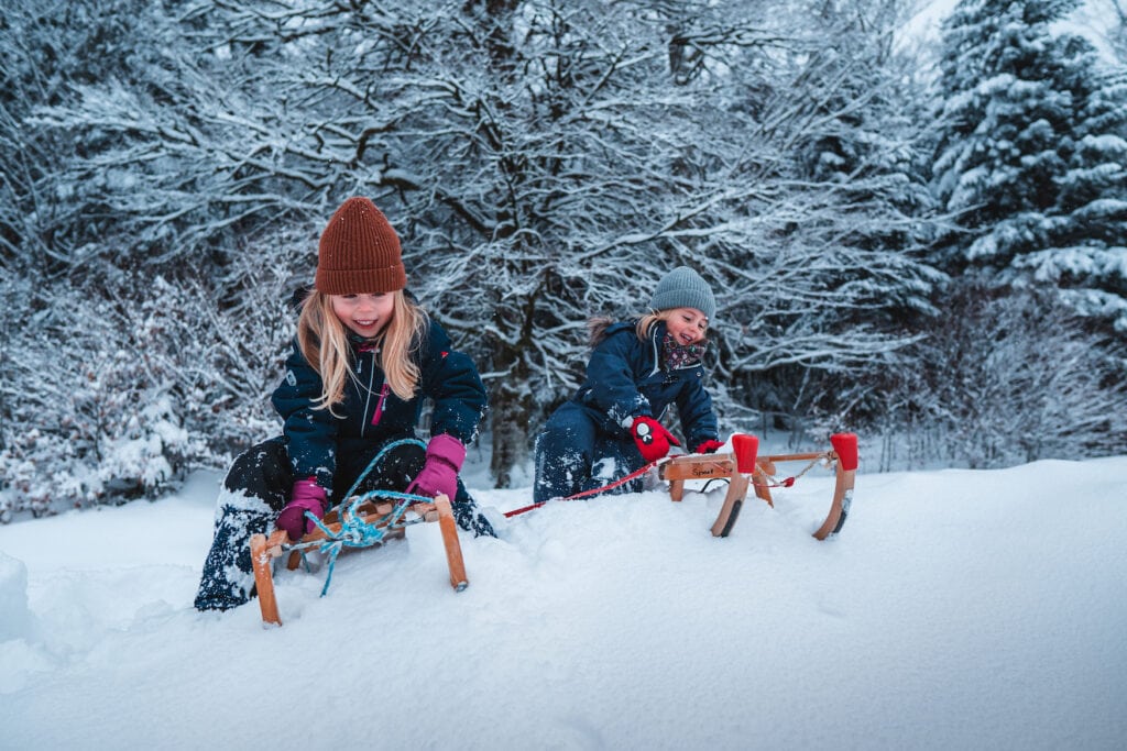 Children tobogganing in the Northern Black Forest