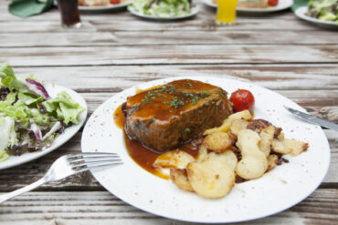 German Saumagen served with potatoes