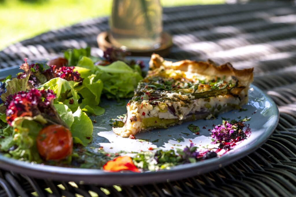 Vegetable quiche with salad