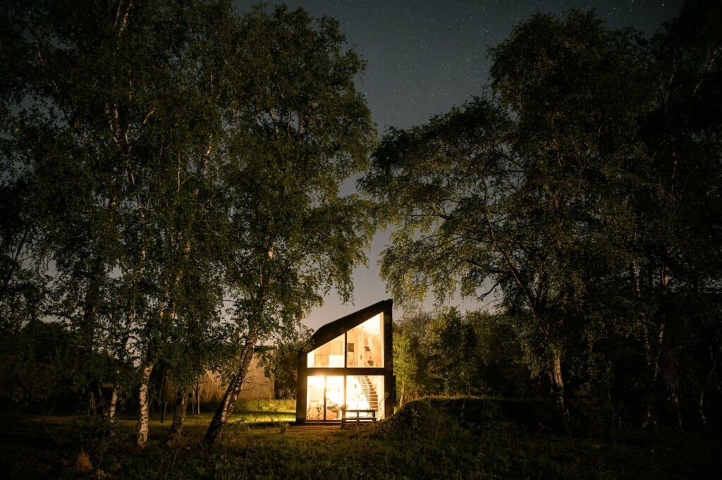 Starry sky above the cabins of Neugrad in the Eifel region