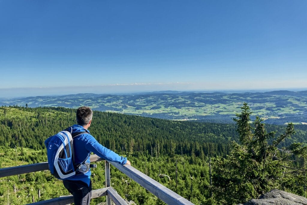 Hiker gazes at Dreisessel in the Bavarian Forest