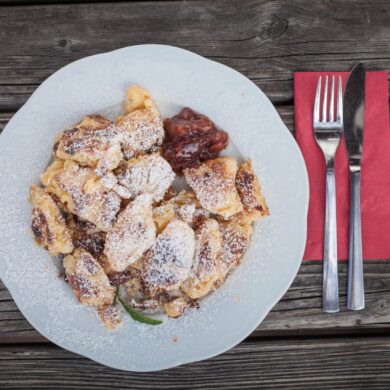 Discover Chiemgau culinary delights in the alpine huts, where local dishes such as Kaiserschmarren are served