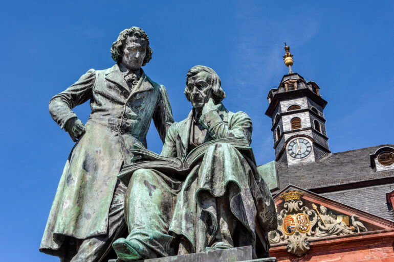 National memorial statue of famous Grimm Brothers in the city center of the German town Hanau