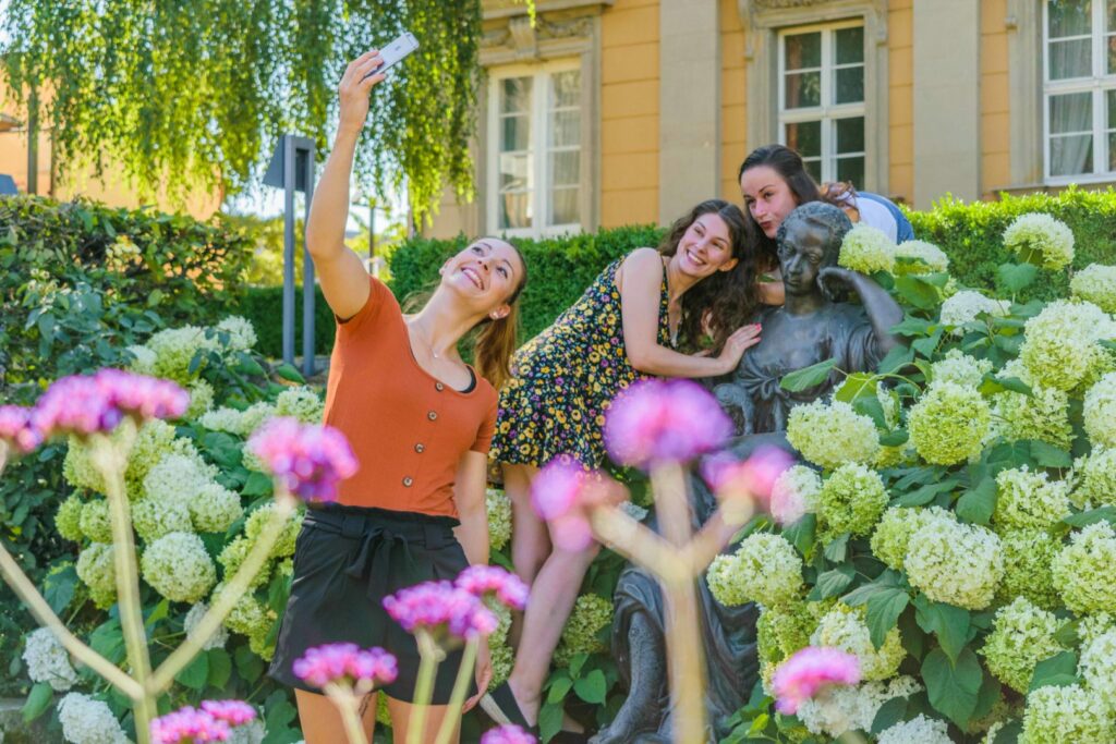 girls taking a selfie in Bayreuth in summer