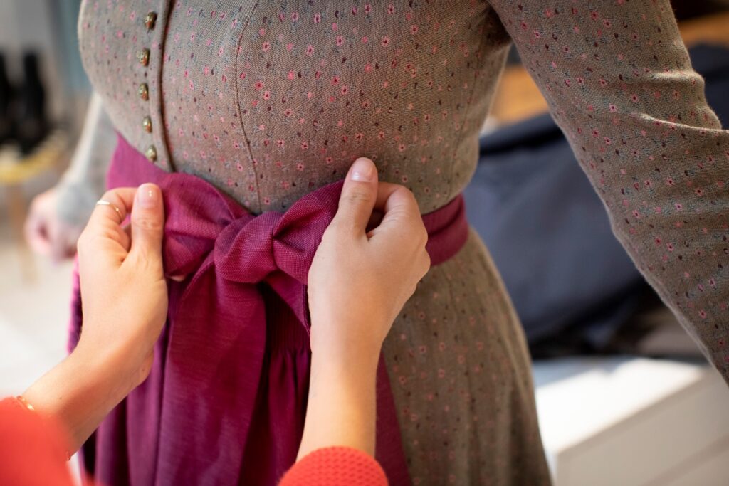 A Dirndl is decorated with a bow