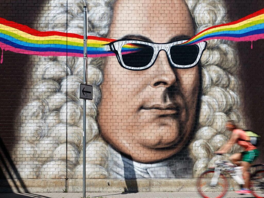 A graffiti shows the composer Handel wearing modern sunglasses