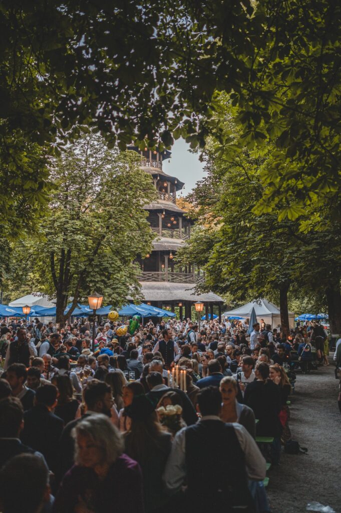 Packed tables in the beer garden at the Chinese Tower, which can be seen in the background