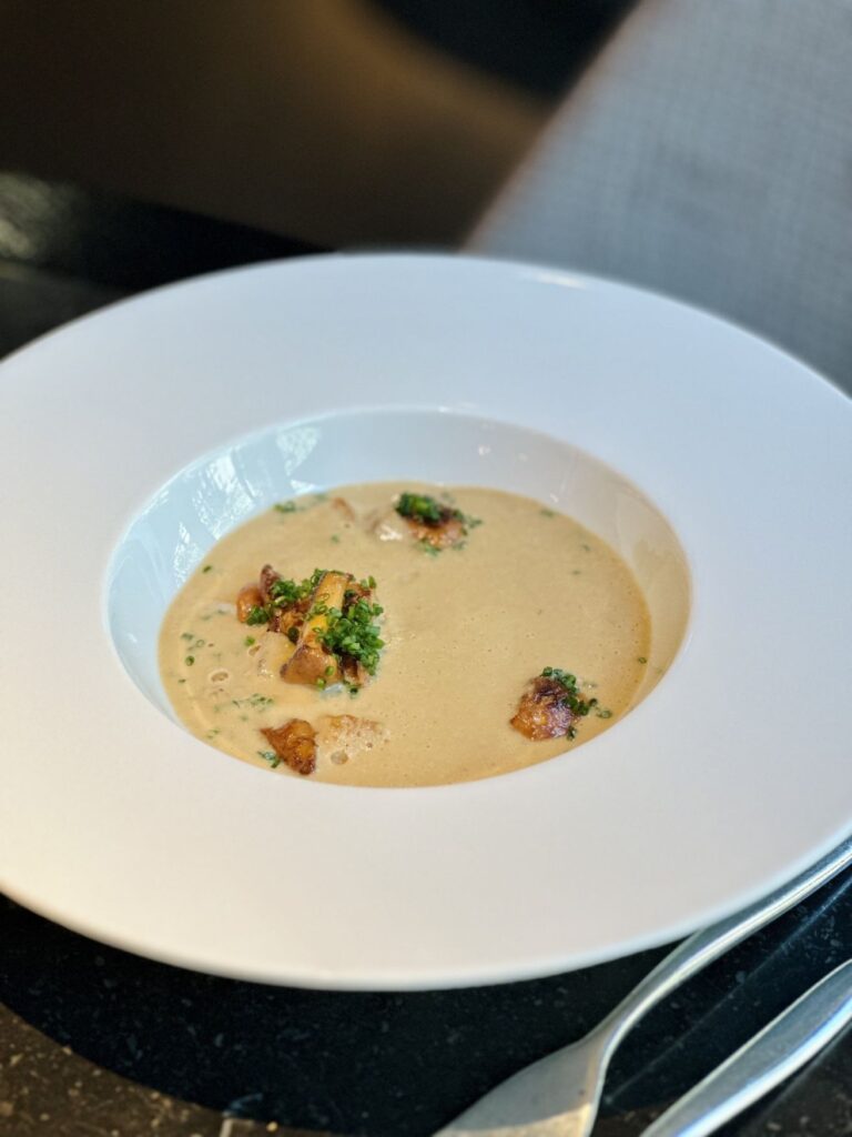 An elegantly prepared chanterelle soup