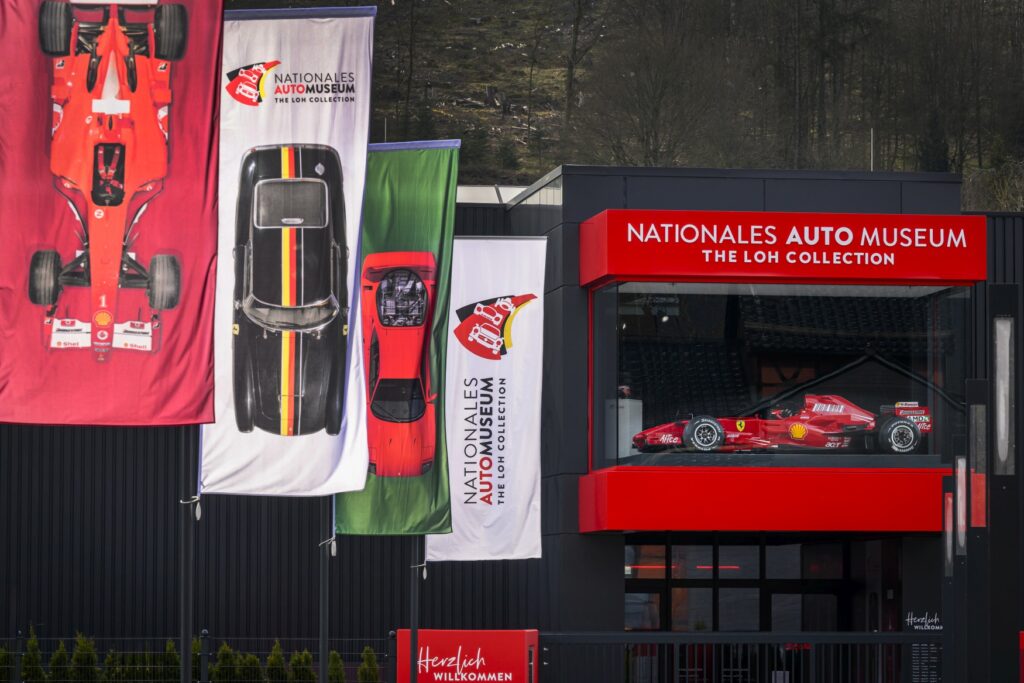 Facade of the National Automobile Museum The Loh Collection with flags in front of it