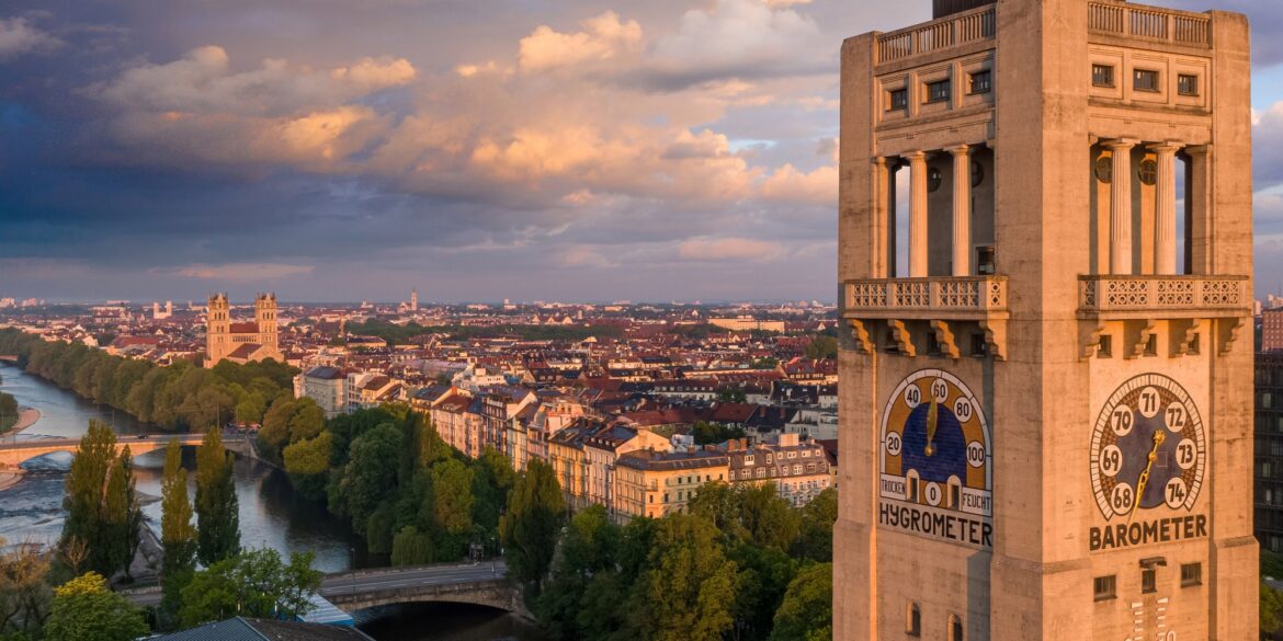 The tower of the Deutsches Museum, which was built on an island in the Isar. On the left side of the picture, on the banks of the Isar, you can see the Catholic Church of St. Maximilian.