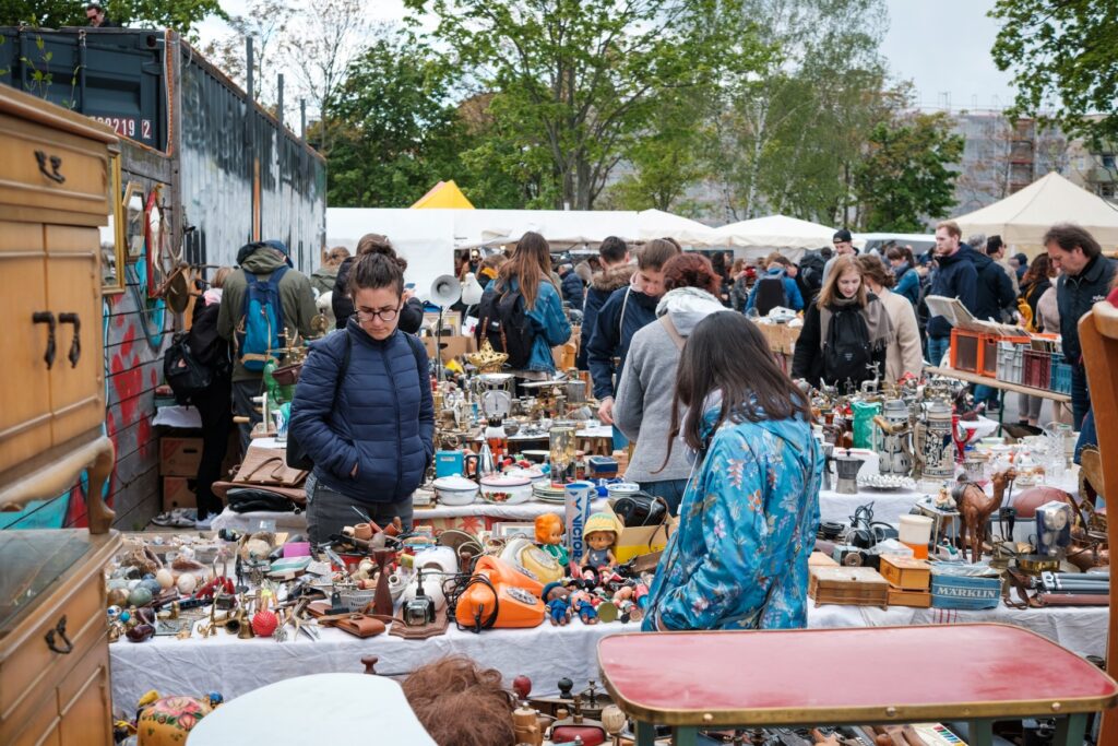 People browse at the flea market in Berlin's Mauerpark.