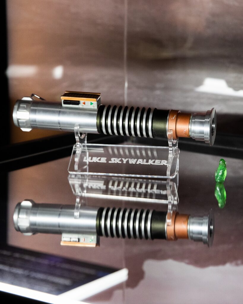 A close-up of a lightsaber replica