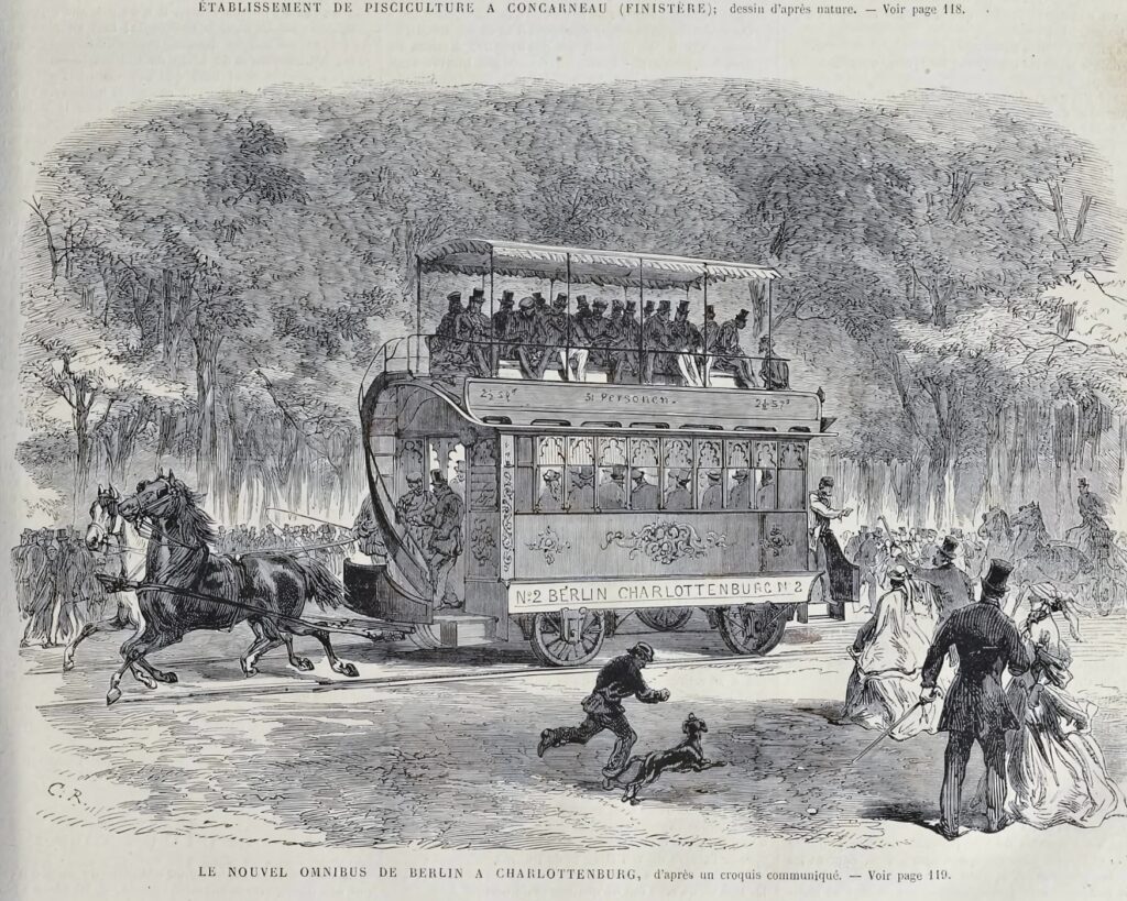 Black-and-white engraving of an early horse-drawn omnibus. The two-story carriage travels from right to left across the image. In the foreground, a child runs with a dog, while a man and a woman in fine clothing stand beside them and watch the carriage. The carriage bears the inscription “No. 2 BERLIN CHARLOTTENBURG.”
