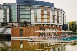 Exterior view of the Ritz Carlton, Wolfsburg, with infinity pool in the foreground