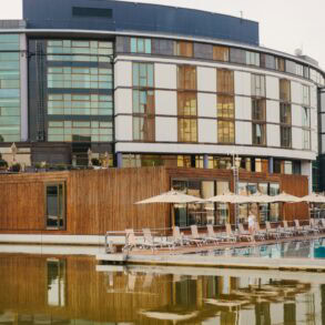 Exterior view of the Ritz Carlton, Wolfsburg, with infinity pool in the foreground