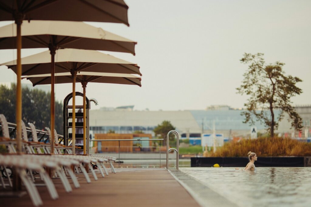 A row of deck chairs by the infinity pool at the Ritz-Carlton, Wolfsburg