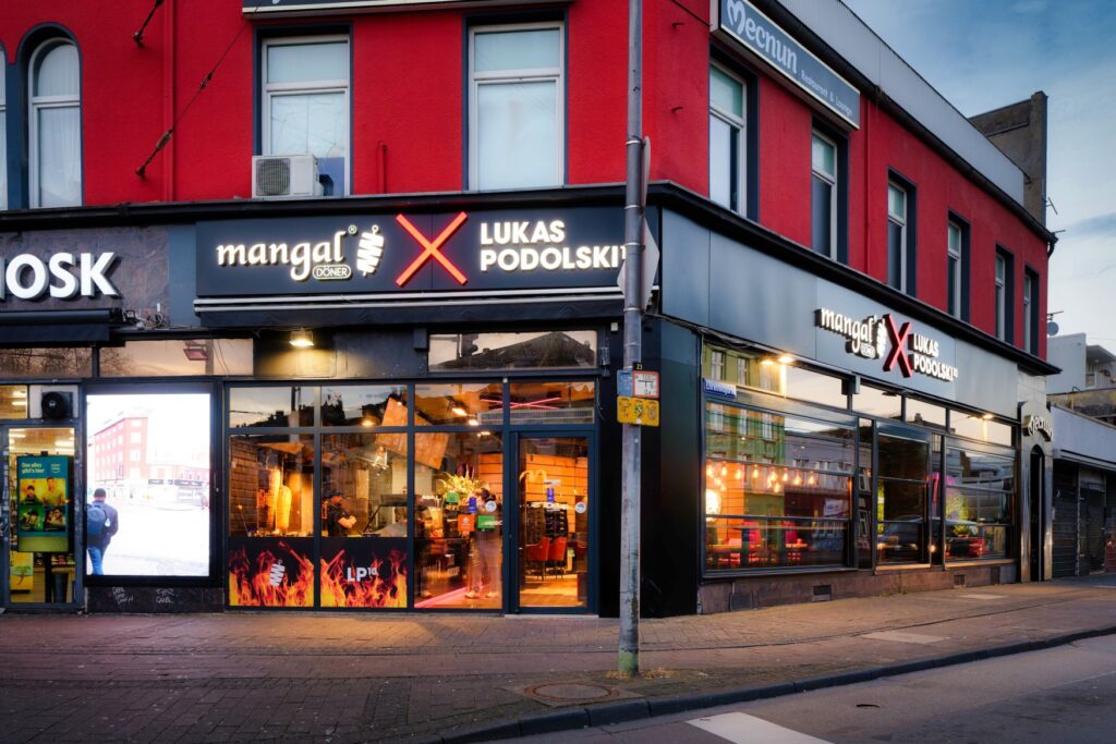 A shot of a branch of the Mangal kebab chain in Cologne-Ehrenfeld in the evening.